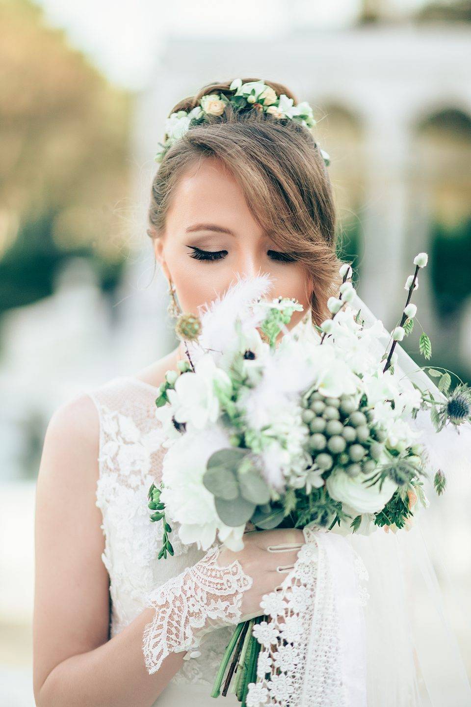 bride at wedding with flowers